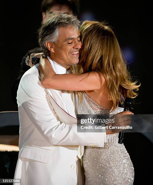 Singers Andrea Bocelli and Celine Dion perform at the Central Park, Great Lawn on September 15, 2011 in New York City.