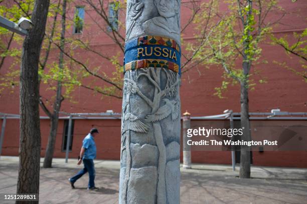 Thursday, April 6, 2023 in Roanoke, Va. A man walks through Century Plaza where a sculpture commemorating one of Roanokes seven Sister Cities, Pskov,...