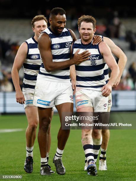 Esava Ratugolea and Patrick Dangerfield of the Cats celebrate during the 2023 AFL Round 04 match between the Geelong Cats and the Hawthorn Hawks at...