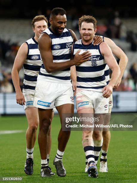 Esava Ratugolea and Patrick Dangerfield of the Cats celebrate during the 2023 AFL Round 04 match between the Geelong Cats and the Hawthorn Hawks at...