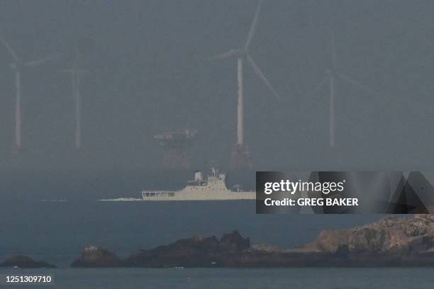 Navy landing ship sails towards the zone where China said it would conduct live fire exercises northeast of Pingtan island, the closest point in...