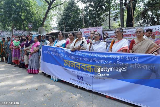 Members of Women's Council of Bangladesh protest after a woman was ordered for caning and stoning following a religious decree, or fatwa, issued by...