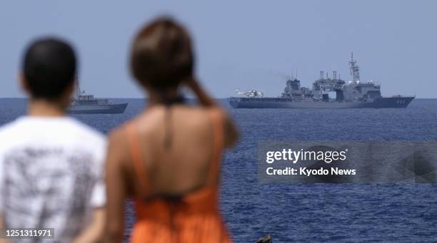 Submarine rescue ship Chihaya of Japan's Maritime Self-Defense Force searches on April 10 in waters off Miyako Island in the southern Japan...