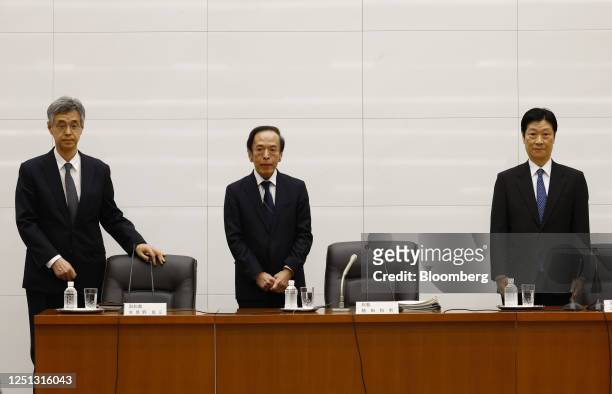 Ryozo Himino, deputy governor of the Bank of Japan , from left, Kazuo Ueda, governor of the Bank of Japan, and Shinichi Uchida, deputy governor of...