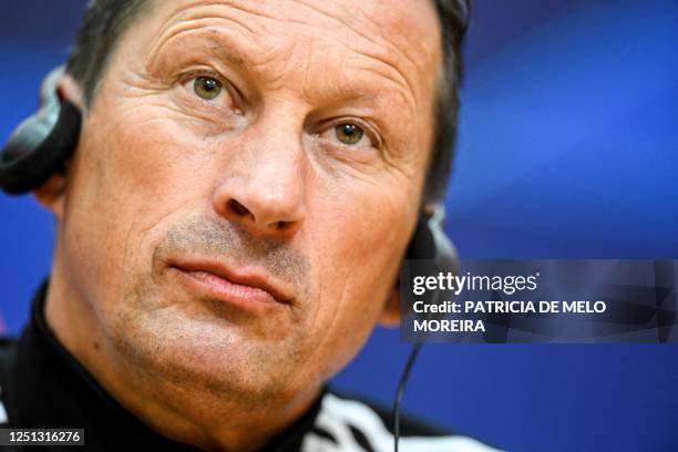 Benfica's German coach Roger Schmidt addresses a press conference at Benfica Campus training camp in Seixal, outskirts of Lisbon, on April 10 on the...