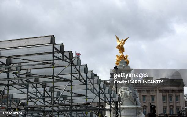 Barriers are pictured near Buckingham Palace in central London on April 10 as preparations get underway ahead of the Coronation of Britain's King...