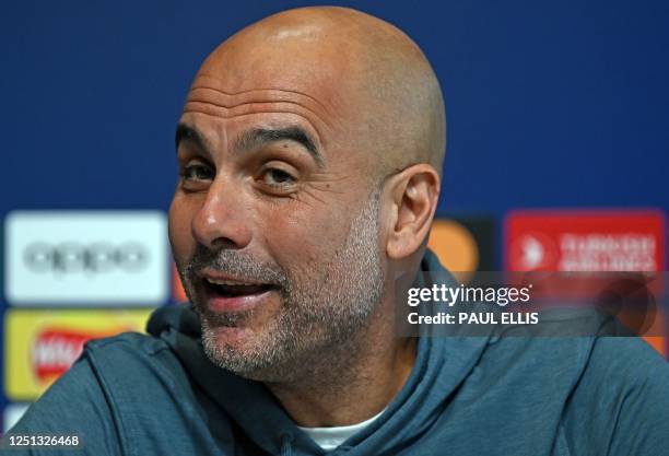 Manchester City's Spanish manager Pep Guardiola attends a press conference at Manchester City training ground in Manchester, north-west England on...