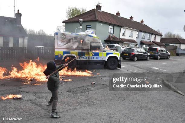 Police vehicle is attacked with petrol bombs ahead of a Dissident Republican parade on April 10, 2023 in Londonderry, Northern Ireland. Derry is host...