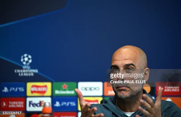 Manchester City's Spanish manager Pep Guardiola attends a press conference at Manchester City training ground in Manchester, north-west England on...