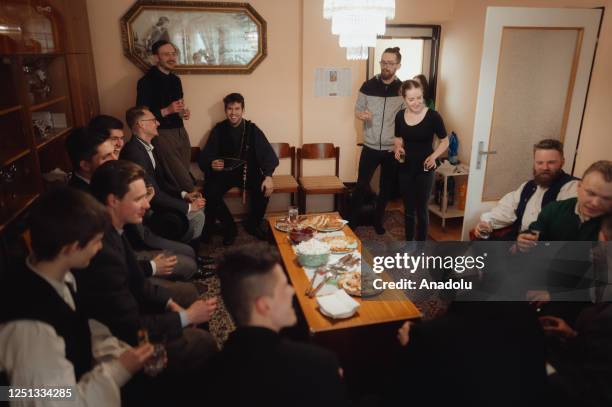 Boys and younger men from the Ilosvai Selymes Peter folk dance group attend the traditional watering of local girls on Easter Monday in Komarovce,...