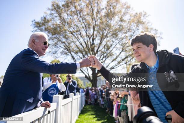 President Joe Biden greets children as he attends the annual Easter Egg Roll on the South Lawn of the White House on April 10, 2023 in Washington,...