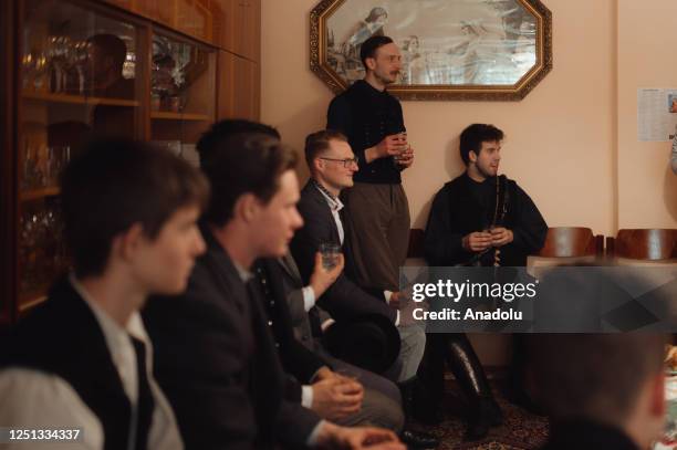 Boys and younger men from the Ilosvai Selymes Peter folk dance group attend the traditional watering of local girls on Easter Monday in Komarovce,...