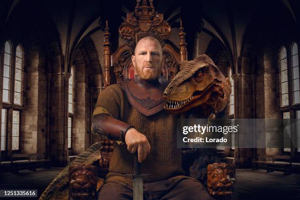 fantastical warrior king on the throne with a pet dinosaur - throne stock pictures, royalty-free photos & images