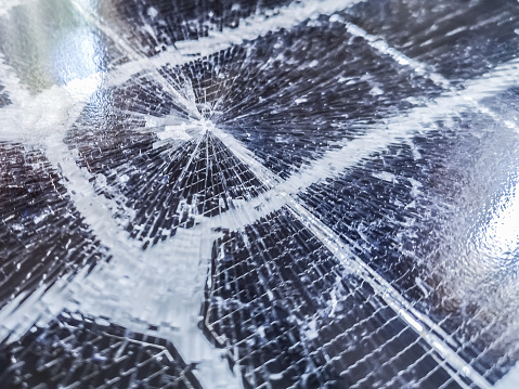 Broken damaged solar panel closeup