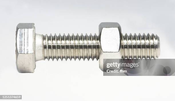 screw with nut - nut fastener stock-fotos und bilder