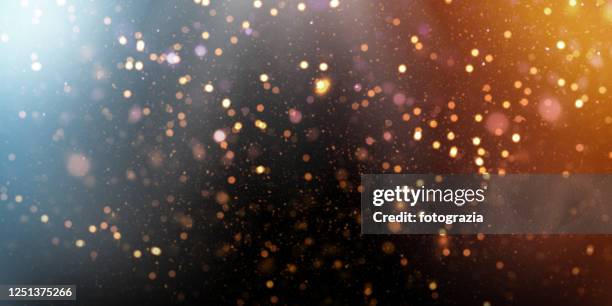 defocused lights background - confetti gold ストックフォトと画像