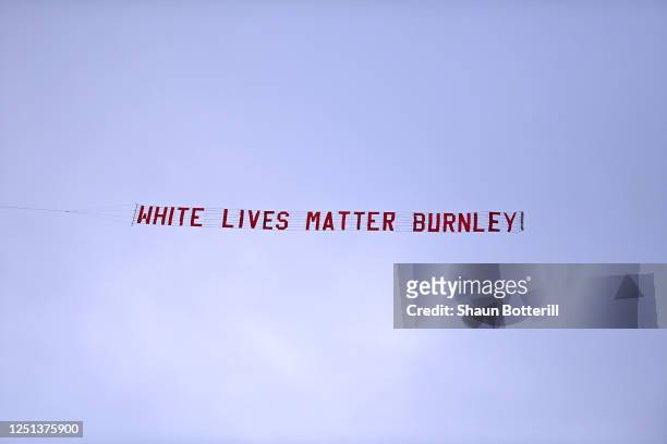 Plane flies over the stadium with a banner reading 'White Lives Matter Burnley' during the Premier League match between Manchester City and Burnley...