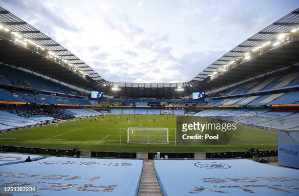 General view inside the stadium showing the empty seat coverings during the Premier League match between Manchester City and Burnley FC at Etihad...