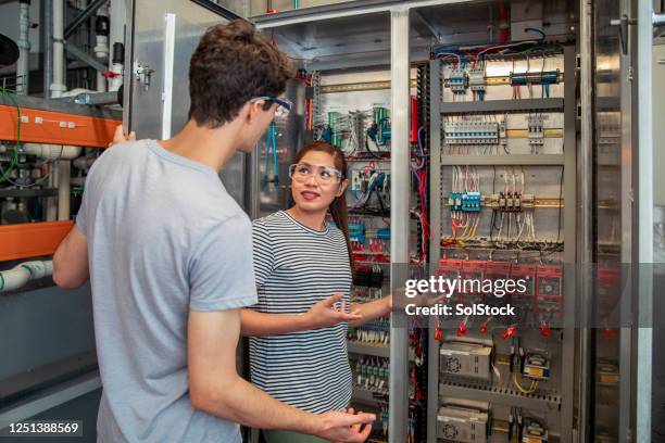 gaining knowledge - electronics engineering students stock pictures, royalty-free photos & images