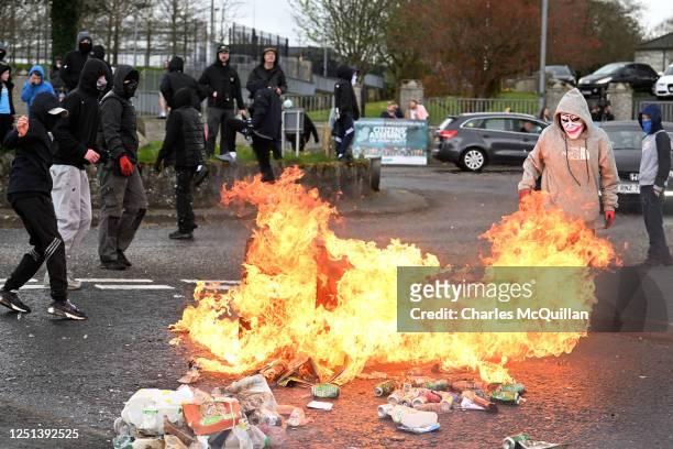 Dissident republican youths create a road block following an illegal Dissident march in the Creggan area on April 10, 2023 in Londonderry, Northern...