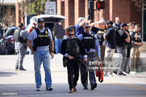 Law enforcement officers respond to an active shooter at the Old National Bank building on April 10, 2023 in Louisville, Kentucky. According to...