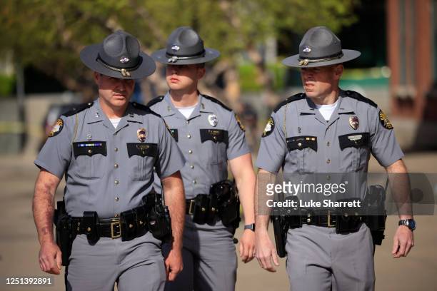 Kentucky State Troopers respond to an active shooter at the Old National Bank building on April 10, 2023 in Louisville, Kentucky. According to...