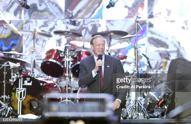 New York State Governor George Pataki addresses the crowd as part of the National Football League's 2002 Kickoff Concert in Times Square on September...