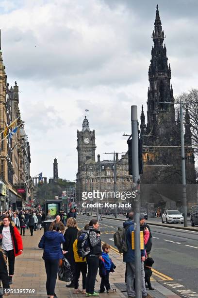 Shoppers and tourists throng Edinburgh's main thoroughfare, Princes Street, on Easter Monday, with some of the city's famous landmarks in the...