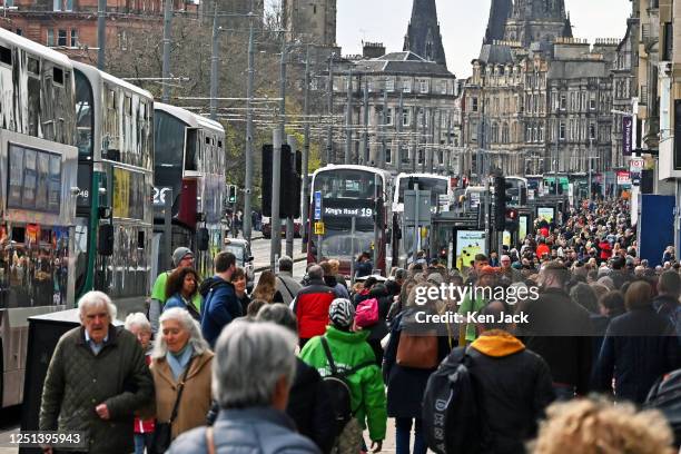 Shoppers and tourists throng Edinburgh's main thoroughfare, Princes Street, on Easter Monday, with some of the city's famous landmarks in the...