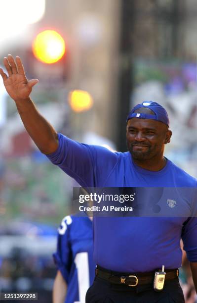 Former National Football League player Lawrence Taylor participates in a fashion show as part of the National Football League's 2002 Kickoff Concert...