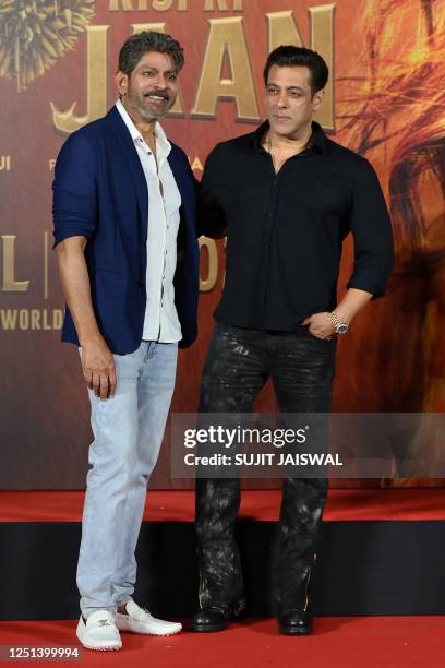 Bollywood actors Salman Khan and Jagapathi Babu pose during the trailer launch of their upcoming film 'Kisi Ka Bhai Kisi Ki Jaan' in Mumbai on April...