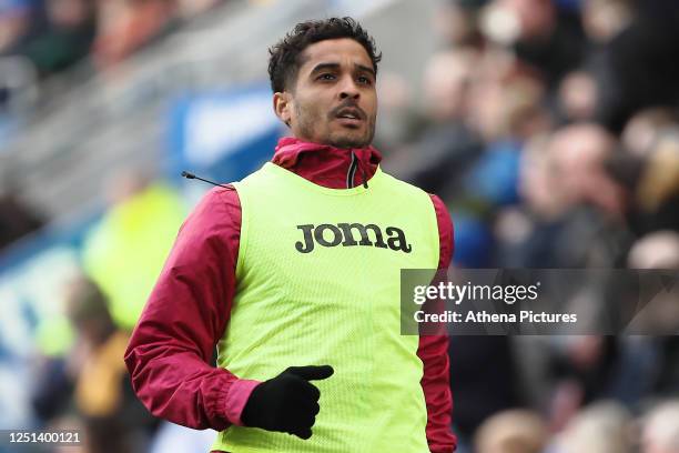 Kyle Naughton of Swansea City warms up during the Sky Bet Championship match between Wigan Athletic and Swansea City at DW Stadium on April 10, 2023...