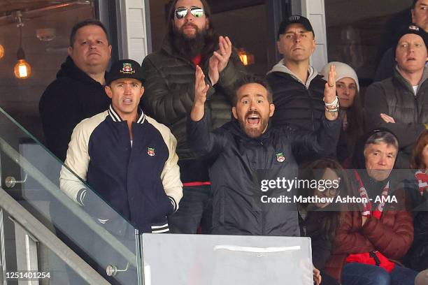 Wrexham Football Club owners Rob McElhenney and Ryan Reynolds watch their team during the Vanarama National League fixture between Wrexham and Notts...