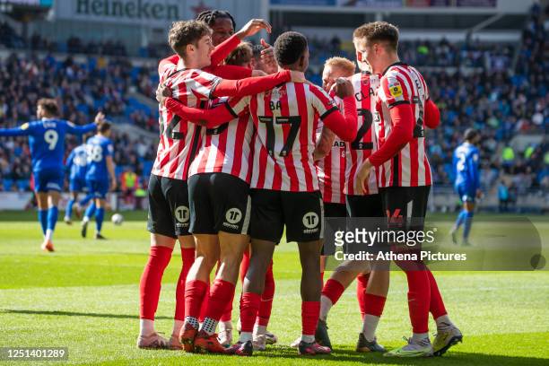 Players of Sunderland celebrate during the Sky Bet Championship match between Cardiff City and Sunderland at the Cardiff City Stadium on April 10,...
