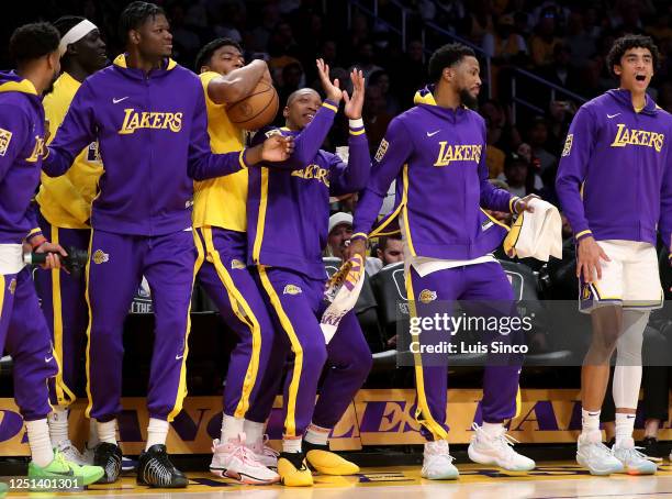 Los Angeles, CA The Lakers bench cheers for the starters during the regular sesaon finale against the Jazz at Crypto.com Arena in Los Angeles on...