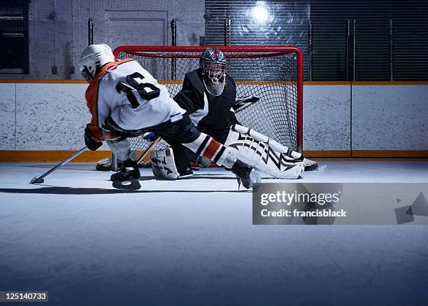 hockey shoot out - hockey goalie stock pictures, royalty-free photos & images