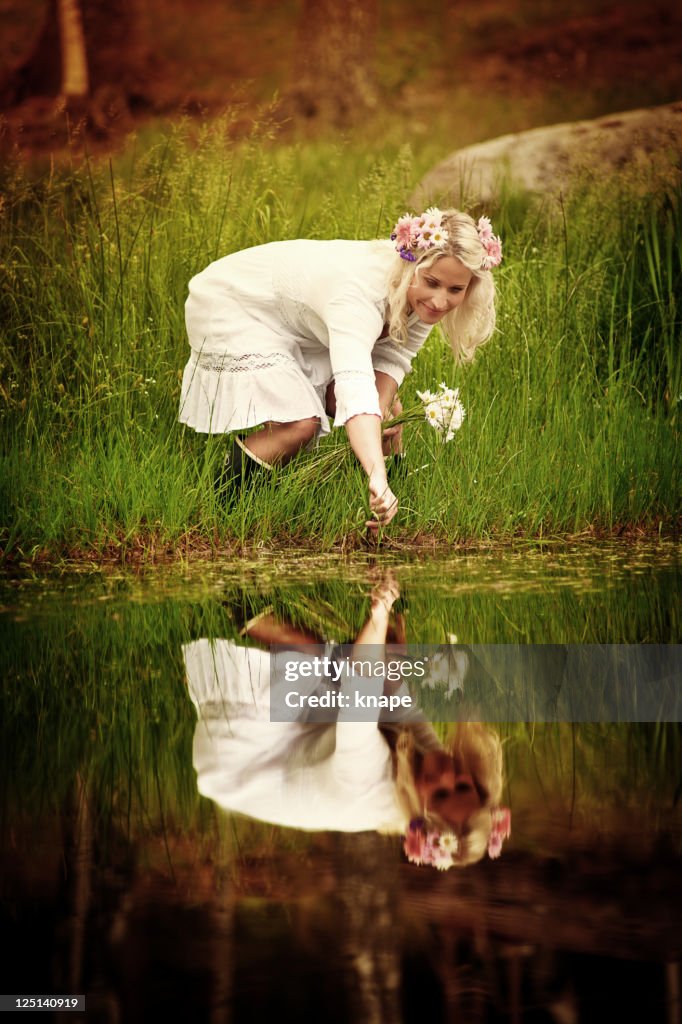 Woman inte by the pond