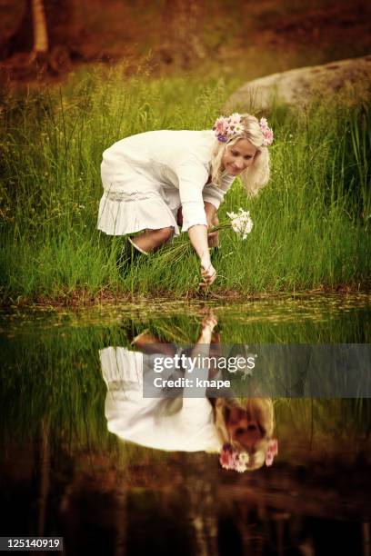 woman inte by the pond - face symmetry stock pictures, royalty-free photos & images