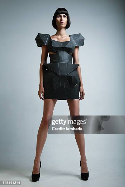 fashion portrait of woman in futuristic dress - dresses stock pictures, royalty-free photos & images