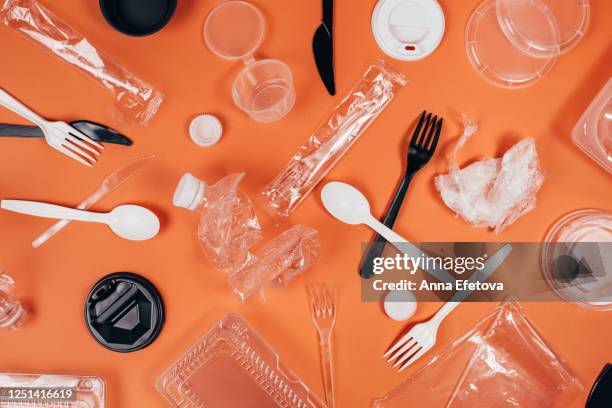 bunch of various plastic trash - disposable silverware stock pictures, royalty-free photos & images