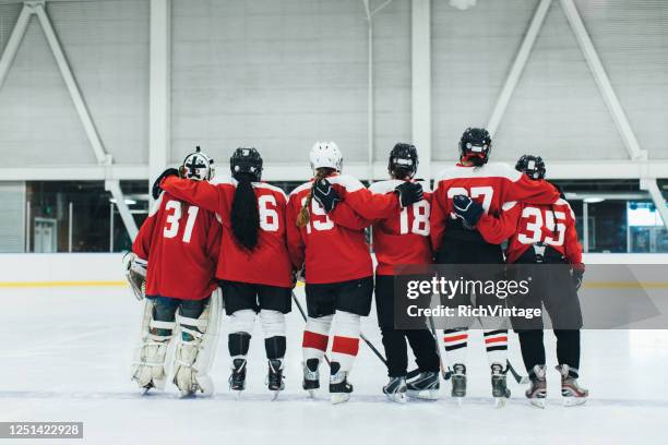 frauen-eishockey-team portrait - eishockey liga stock-fotos und bilder