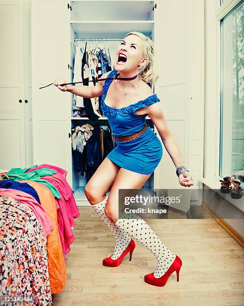 woman frustrated with what to wear - high heels photos stockfoto's en -beelden