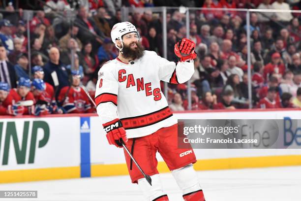 Brent Burns of the Carolina Hurricanes celebrates a goal against the Montreal Canadiens during the second period in the NHL game at the Centre Bell...