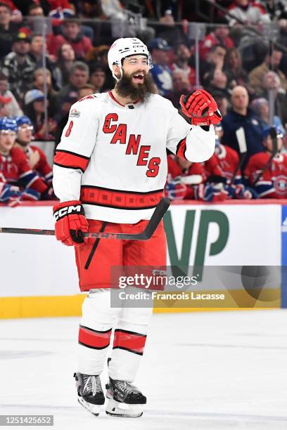 Brent Burns of the Carolina Hurricanes celebrates a goal against the Montreal Canadiens during the second period in the NHL game at the Centre Bell...