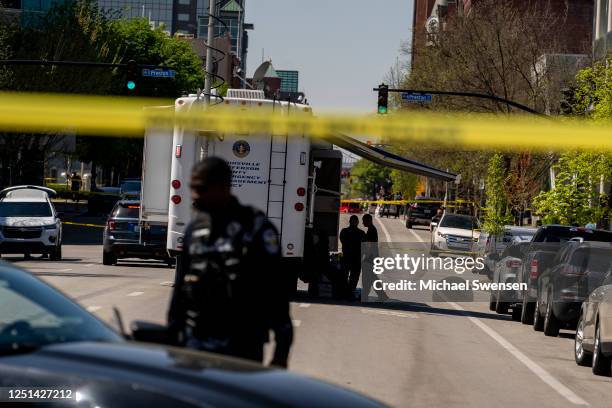 Police tape surrounds the Old National Bank after a gunman opened fire on April 10, 2023 in Louisville, Kentucky. A gunman who was also confirmed...