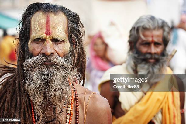 indian holy men at pushkar camel fair - beard stock pictures, royalty-free photos & images