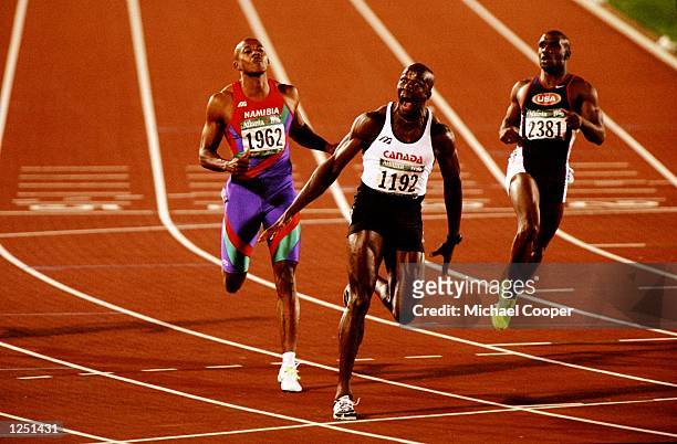 Donovan Bailey of Canada defeats Frankie Fredericks of Namibia and Dennis Mitchell of the USA for the gold medal in th 100m final at the Olympic...