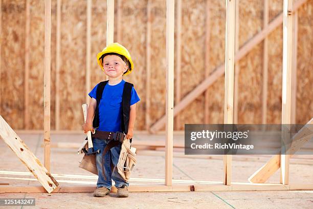 little carpenter boy - boy in hard hat stock pictures, royalty-free photos & images