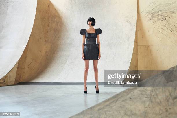 fashion portrait of woman in futuristic dress - petite young models stock pictures, royalty-free photos & images