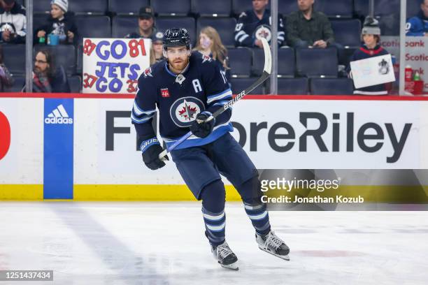 Adam Lowry of the Winnipeg Jets takes part in the pre-game warm up prior to NHL action against the San Jose Sharks at the Canada Life Centre on April...